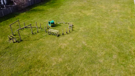 A-view-from-above-of-a-children's-play-area-surrounded-by-a-calm-suburb