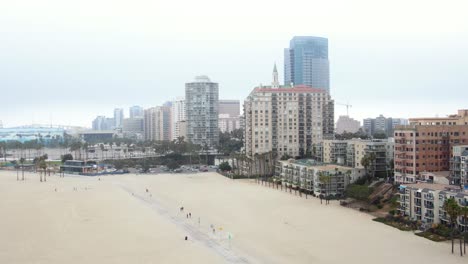 4K-Drone-Orbit-Long-Beach-City-Buildings-and-Sand