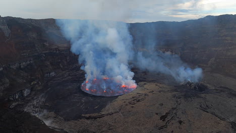 Lava-lake-smokes-in-crater-of-Mt-Nyiragongo-volcano-near-Goma,-Congo