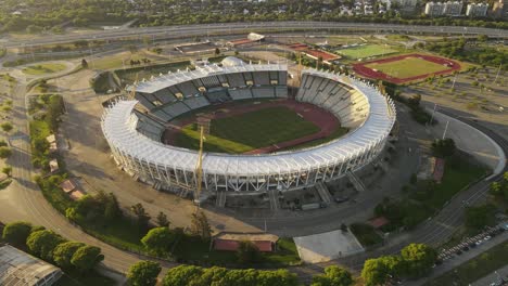 Aerial-view-of-Football-Stadium-in-Cordoba-and-freeway-with-traffic-in-background-