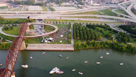 Aerial-drone-view-of-a-open-air-concert,-sunset-in-Louisville,-United-states