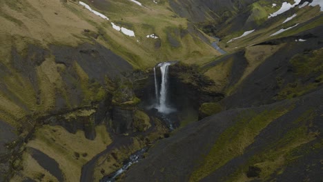 Breathtaking-Aerial-Zoom-in-of-Kvernufoss-Waterfall-in-Iceland