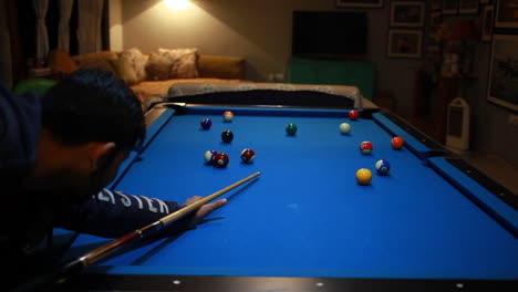 man-enjoy-to-play-cue-sport-or-billiard-game