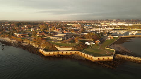 Gorgeous-sunset-drone-shot-of-the-Southern-Maine-Community-College-near-Fort-Preble