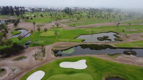 Drone-video-of-a-golf-course-on-a-foggy-day