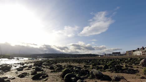 Cloudy-morning-timelapse-British-seaside-town-sandy-coastline-tourist-destination