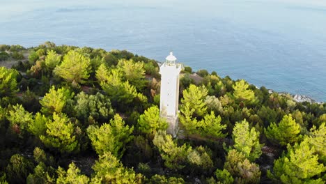 New-Fiscardo-Lighthouse-Surrounded-With-Green-Woods-In-Kefalonia-Island,-Greece