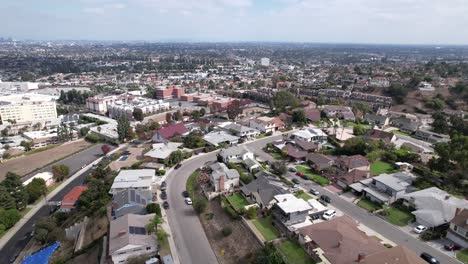Aerial-View-Above-Divide-between-Residential-Districts-of-Baldwin-Hills-and-Crenshaw-Neighborhoods,-Los-Angeles,-California