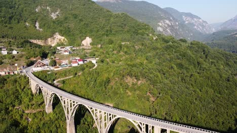 Durdevica-Tara-Bridge-and-Canyon-at-Zabljak,-Durmitor-National-Park,-Montenegro---Reversing-Aerial