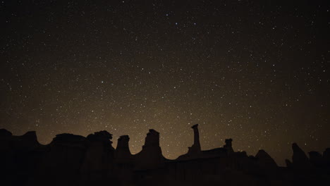 4K-Timelapse-of-stars-and-clouds-over-hoodoo-rock-formations-in-Bisti-Badlands