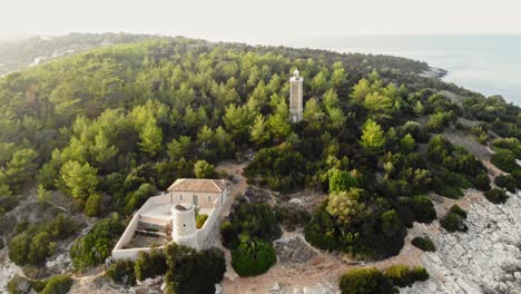 Famous-Venetian-Lighthouse-And-Byzantine-Bascilica-in-Kefalonia-Greece---aerial-shot