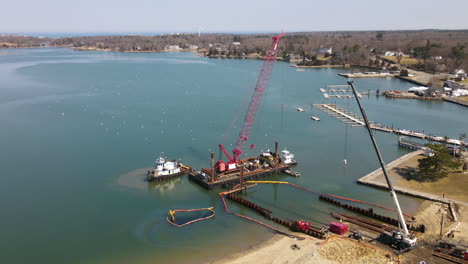 Aerial-Timelapse-of-Tug-Boat-manoeuvring-Crane-on-the-water