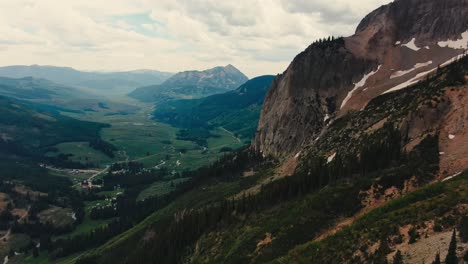 Drone-View-Of-Steep-Colorado-Mountain-with-Gorgeous-Valley-In-the-Background
