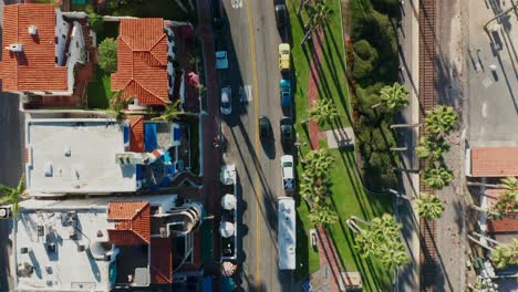 Tracking-aerial-view-of-a-car-in-San-Clemente,-California