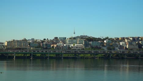 Scenic-view-of-the-Han-River-and-the-Yongsan-District-of-Seoul-South-Korea-featuring-the-Namsan-Tower-which-was-the-first-radio-tower-in-Korea