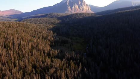 Stunning-aerial-drone-landscape-nature-tilting-up-shot-of-the-beautiful-Red-Castle-Lake-mountain-up-in-the-high-Uinta's-between-Utah-and-Wyoming-on-a-backpacking-trip-on-a-clear-summer-evening