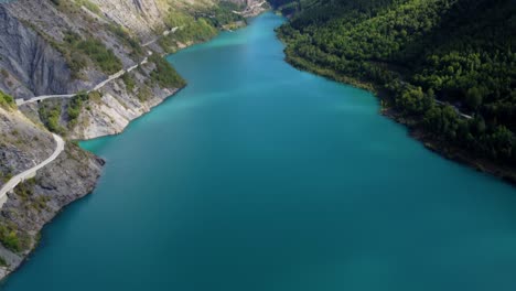 Aerial-view-blue-clear-unpolluted-natural-park-lake-on-the-alps-mountains-region
