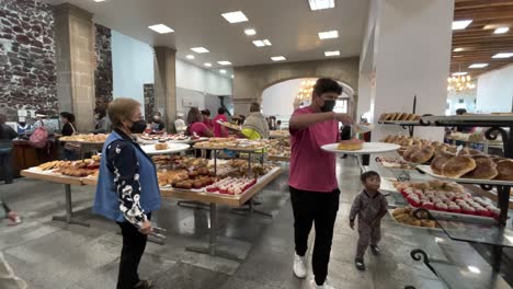 shot-of-people-buying-bread-in-a-bakery-in-the-center-of-mexico-city