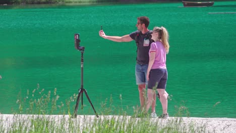 A-couple-taking-a-selfie-at-lake-Braies