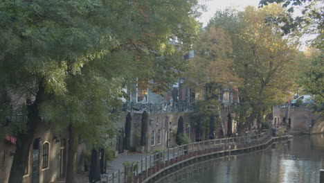 View-of-canals-and-closed-restaurants-at-docks-in-Utrecht-city,-the-Netherlands