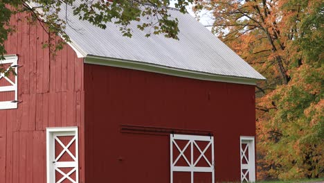 Red-Barn-with-White-Trim-in-Autumn