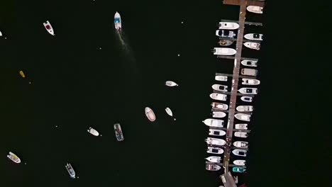 Aerial-top-down-view-over-yachts-parked-at-dock-near-Hingham-sailing-club