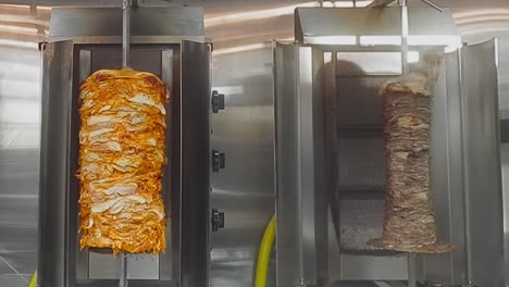 4k-Loop4-4-Chicken-breasts-marinated-Vertical-BBQ-Rotisserie-next-to-thinly-sliced-steaks-stacks-of-sirloin-triple-'A'-Beef-Shawarma-rotating-on-a-360-degree-upright-spit-in-a-stainless-steel-grill