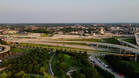 Aerial-view-of-cars-on-interstate-65-and-64-in-Louisville,-Kentucky,-USA---pan,-drone-shot