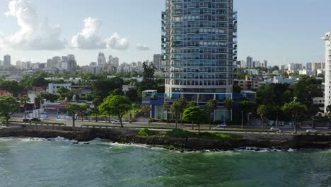 Drone-flying-along-Malecon-seafront-at-Santo-Domingo-in-Dominican-Republic