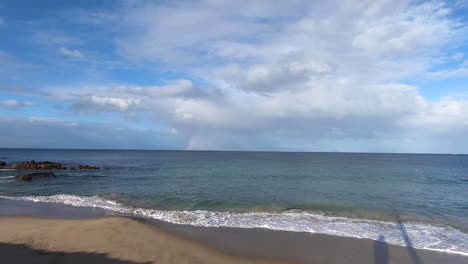 The-bay-with-rainbow-in-the-distance