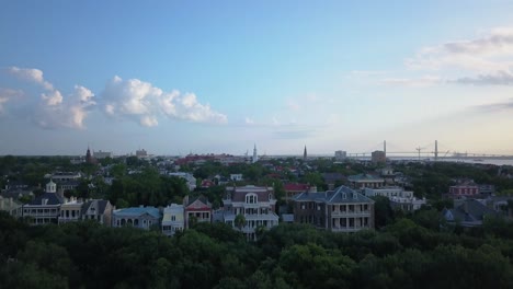 Rising-drone-view-of-a-golden-morning-in-historic-Charleston,-SC