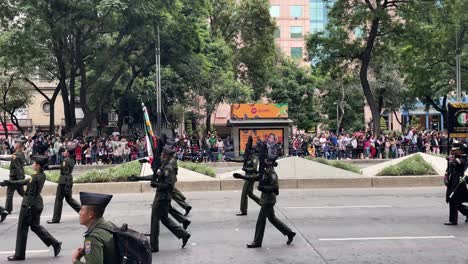 slow-motion-shot-of-the-expeditionary-corps-of-air-forces-of-the-mexican-army-during-the-military-parade-in-the-avenue-of-the-paseo-de-la-reforma-in-mexico-city