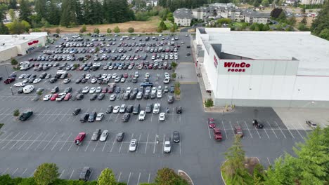 Wide-orbiting-aerial-view-of-a-busy-Winco-Foods