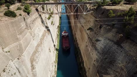 View-of-a-boat-in-the-Corinth-canal,-Greece