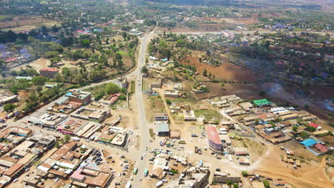 Aerial-view-of-a-busy-town-in-rural-Kenya,-Africa