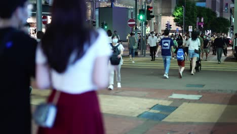 Atmosphere-people-walking-on-the-street-of-night-in-Hongkong
