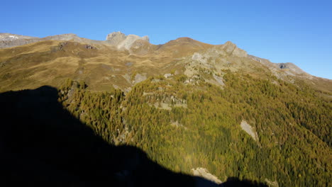 Hillside-Forest-Of-La-Tieche-Valley-Near-Crans-Montana-Ski-Resort-On-A-Sunny-Autumn-Day-In-Valais,-Switzerland