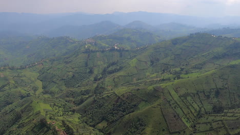 Stunning-flyover-of-fields-and-pastures-on-steep-jungle-hills-in-Congo