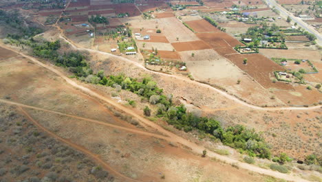 Aerial-farms-and-buildings-in-a-beautiful-rural-landscape-in-Kenya