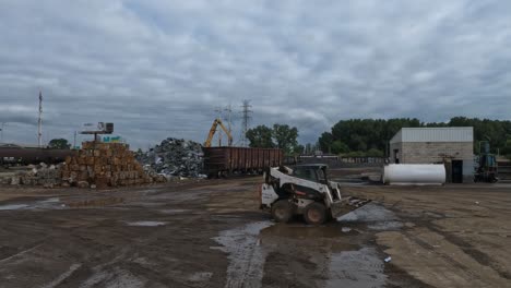 Bulldozer-driving-over-construction-site