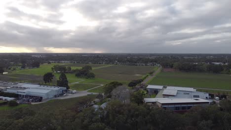Sunset-Aerial-Descending-View-Sandalford-And-Mandoon-Wineries,-Swan-Valley-Perth