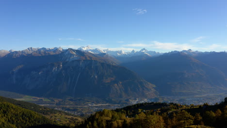 Rhone-Valley-And-Sierre-City-With-Swiss-Summits-In-Background-From-Crans-Montana-Ski-Resort,-Valais,-Switzerland