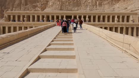 Panning-Shot-Revealing-Tourists-Making-Their-Way-Up-To-The-Mortuary-Temple-Of-Hatshepsut