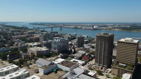 Downtown-Baton-Rouge,-Louisiana-and-Horace-Wilkinson-Bridge-Wide-Aerial-Tracking-Forward
