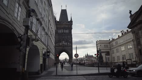 Old-Town-Bridge-Tower-in-Prague,-Czech-Republic,-gimbal-walking-wide-angle-view