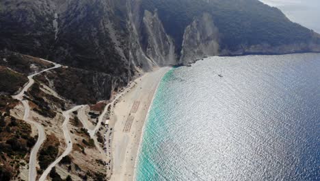 Turquoise-Bay-And-Beach-Of-Myrtos,-Cefalonia-Island,-Ionian,-Greece---aerial-drone-shot