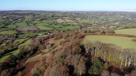 Aerial-left-panning-view-of-the-East-Devon-and-English-Countryside-from-Dumpdon-Hill-on-a-sunny-day