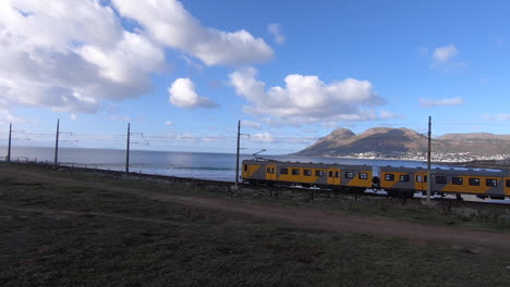 Train-travelling-along-coastal-route