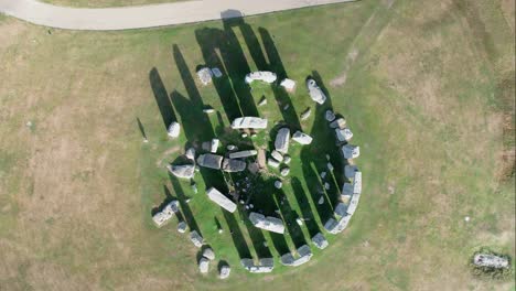 Stonehenge-prehistoric-stone-circle-ruins-on-Amesbury-countryside-aerial-view-top-down-rotating