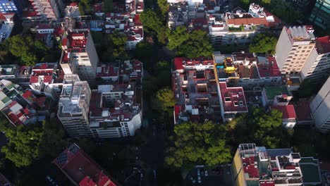 Aerial-view-overlooking-streets-of-Polanco-golden-hour-in-Mexico-city---high-angle,-drone-shot